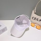 Tyga 7 Star Wearing a Prada Replica Bucket Hat